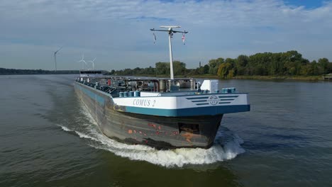 huge ship of comus 2 chemical tanker sailing near barendrecht, netherlands