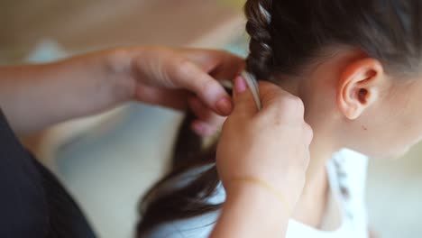 braiding a child's hair