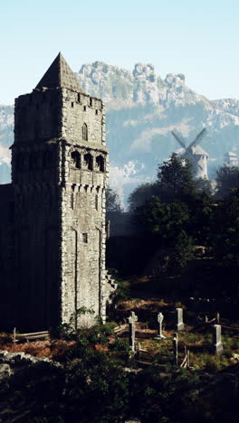 torre de piedra medieval y cementerio en un paisaje de fantasía