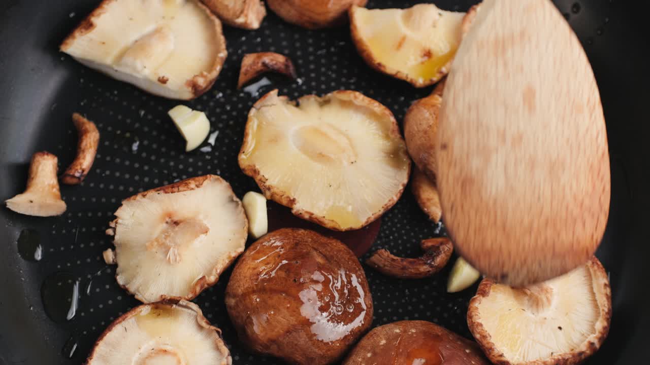 Frying Shiitake Mushrooms with Garlic in a Pan