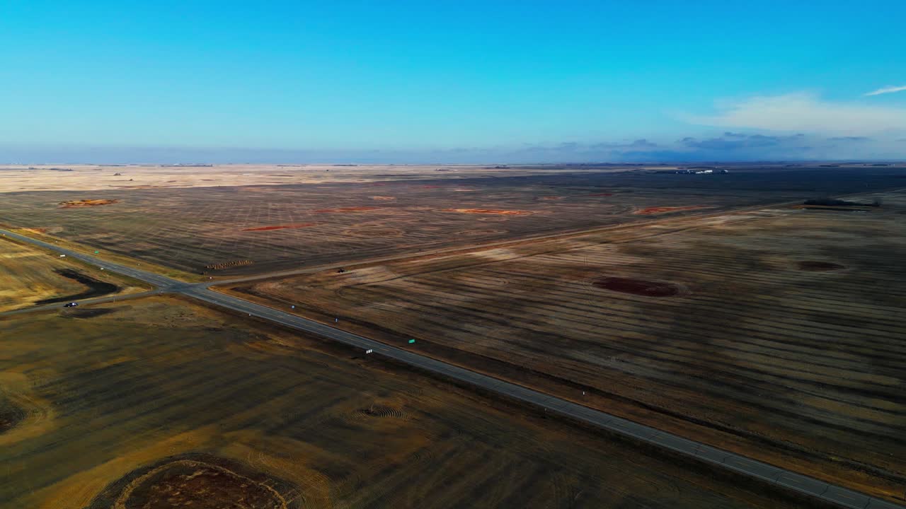 High-altitude aerial farmlands view with straight roads and fields at Loreburn, Saskatchewan, Canada