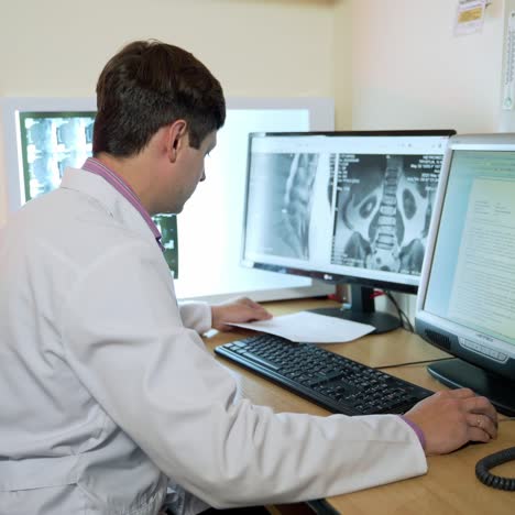 advanced scientific lab for medicine. male doctor with computer working at hospital