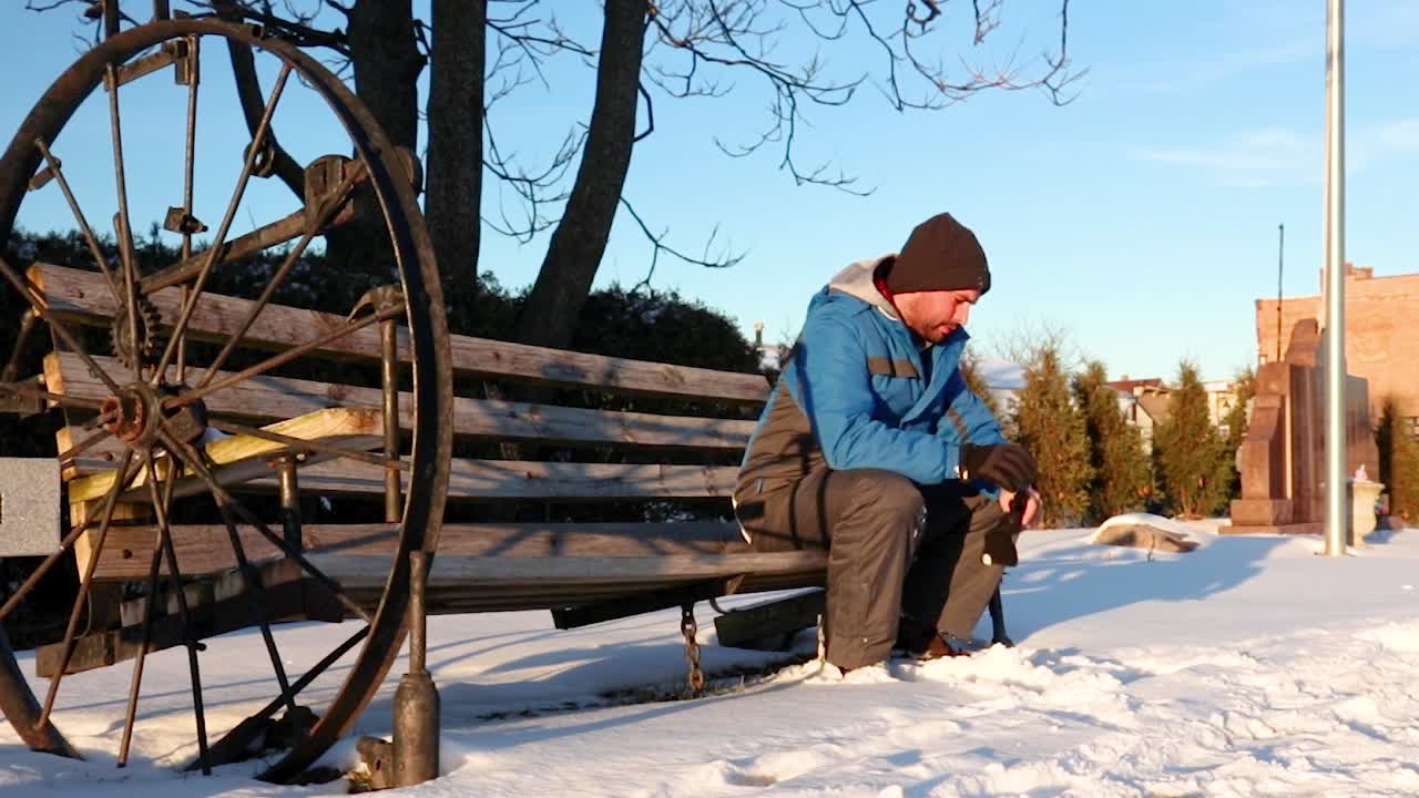 An impatient guy waiting on his friend to arrive for their meeting