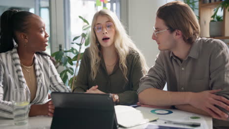 diverse team collaborating in modern office meeting