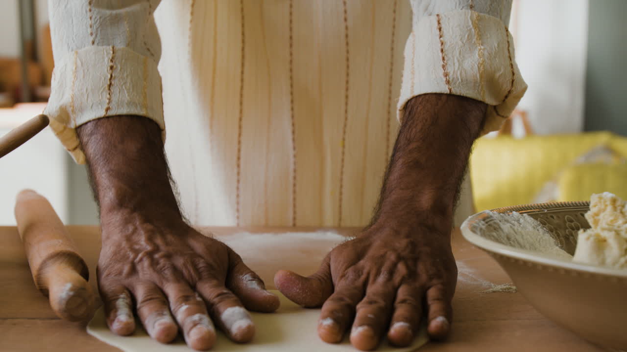 Man Making Flatbread in Home Kitchen