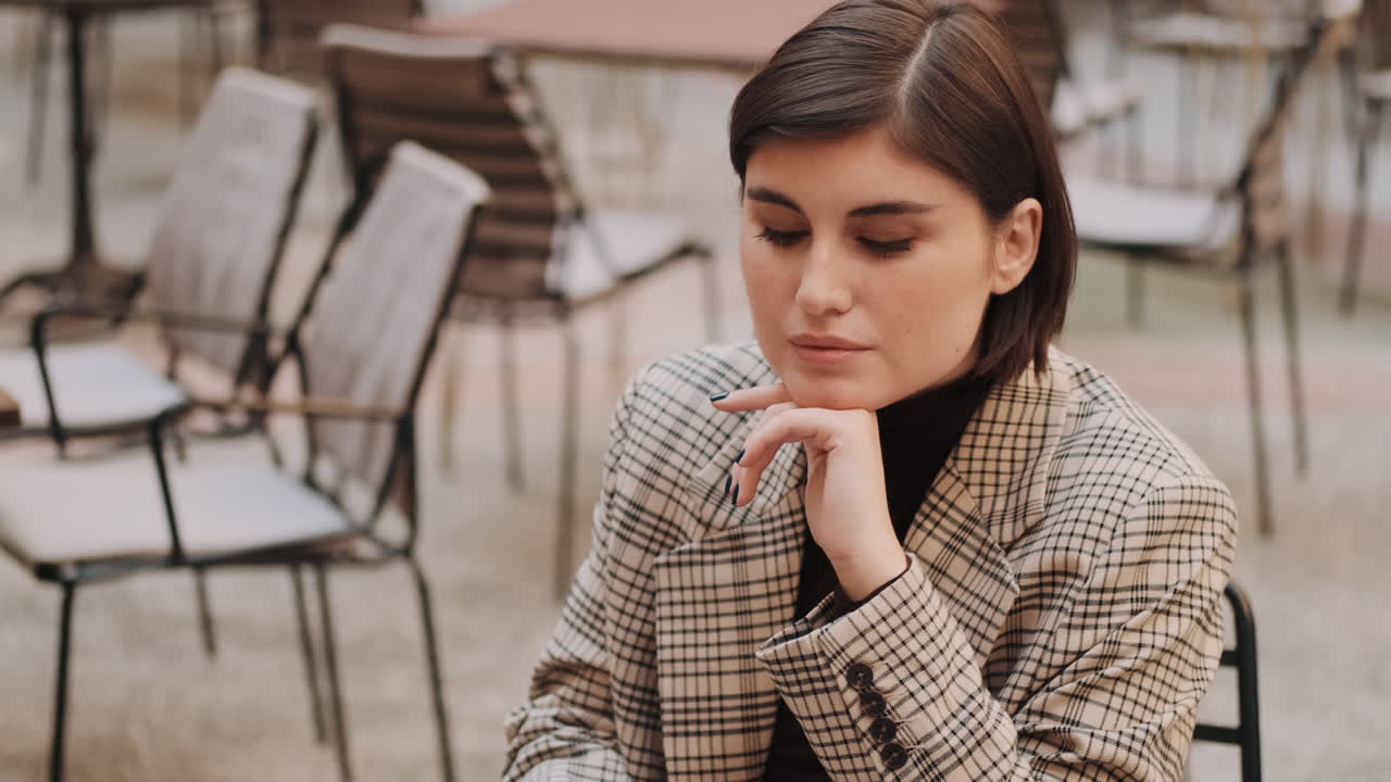 Young businesswoman working outdoor.