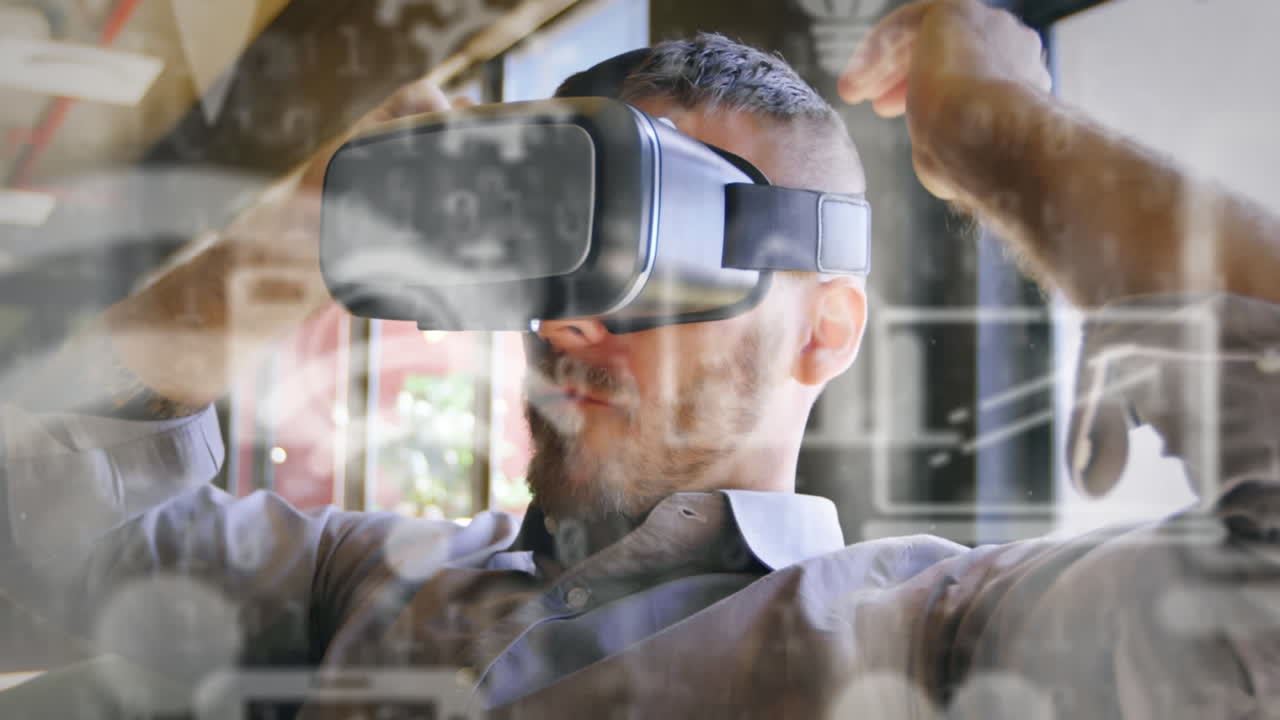 Animation of data processing and social media icons over caucasian man wearing vr headset