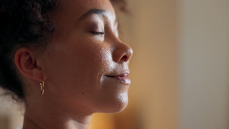 woman in profile, eyes closed