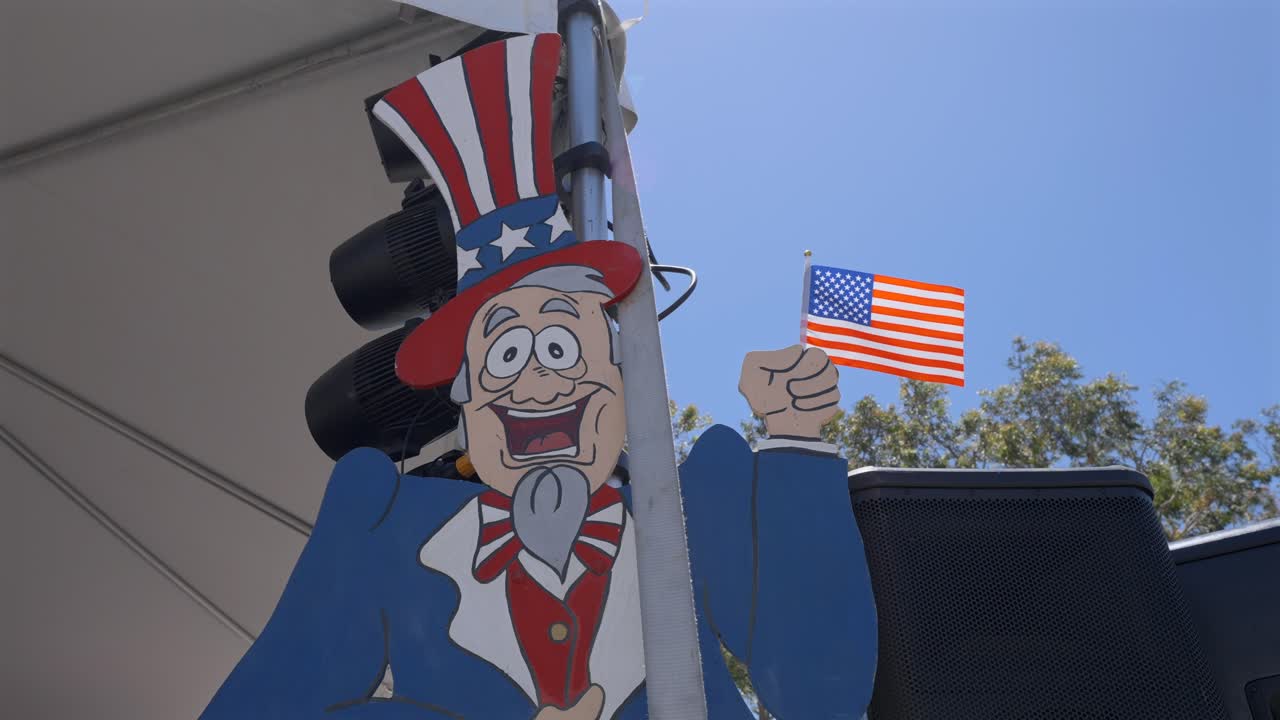 미국 국기를 들고 만화 엉클 샘