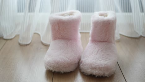 pair of pink fluffy slippers