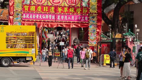 crowds gather at vibrant festival entrance