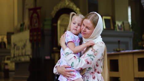 mother and daugher in the church