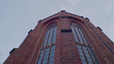 traditional european dutch style cathedral chapel architecture building in netherlands with authentic art design and sightseeing walkthrough and low wide angle viewpoint