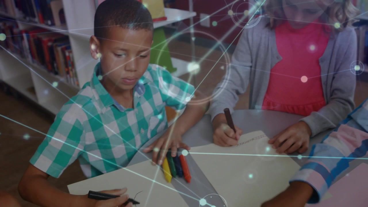 Camera panning across school table while classmates drawing with markers under network overlay
