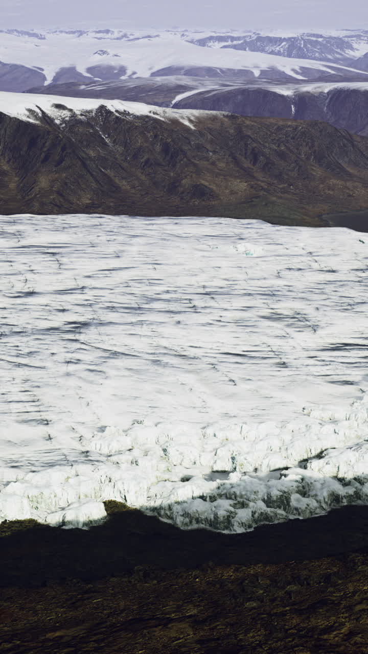 Stunning view of a glacier retreating into the ocean under a clear sky