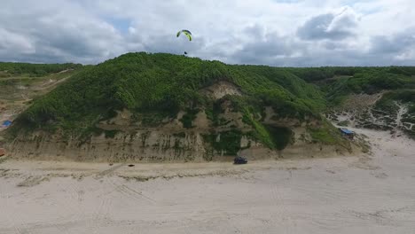 Paraglider-Flying-Over-Hill-Drone-Chase