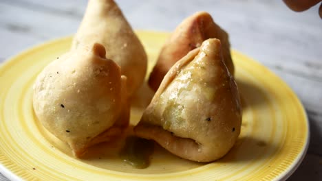 detail shot of a indian food singara on plate