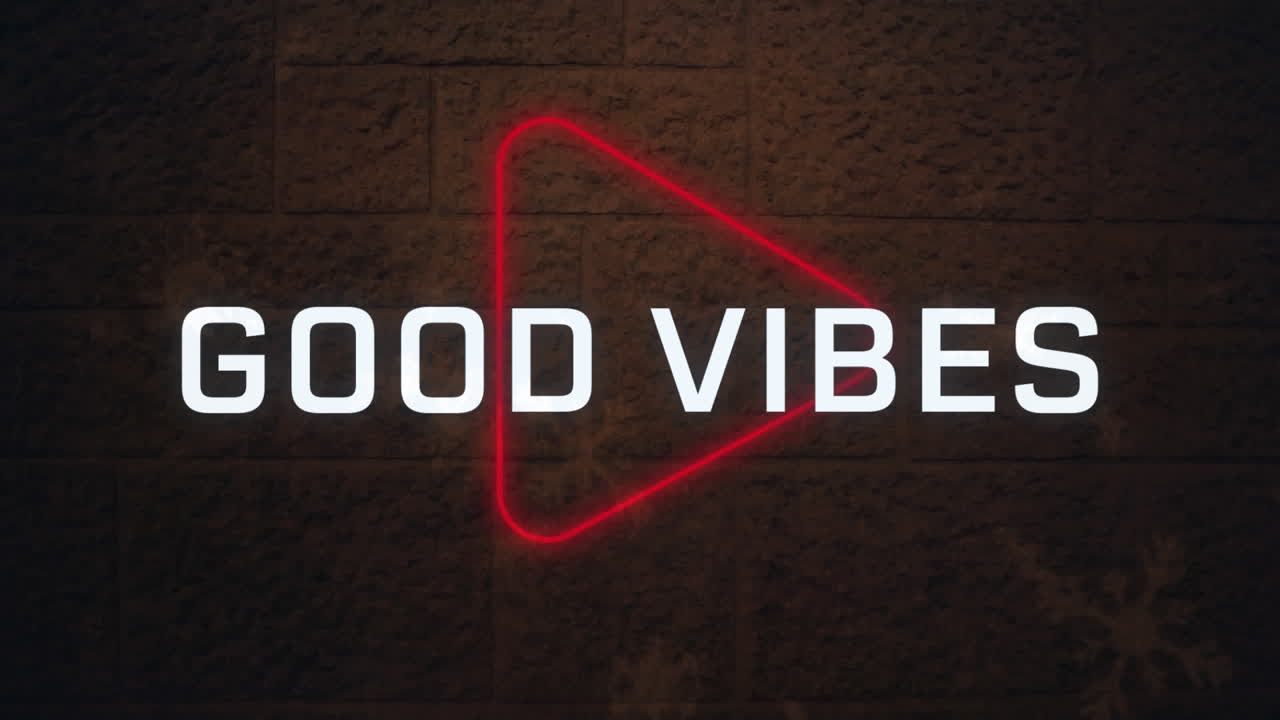 Animation of good vibes text banner over neon play icon against red brick wall background