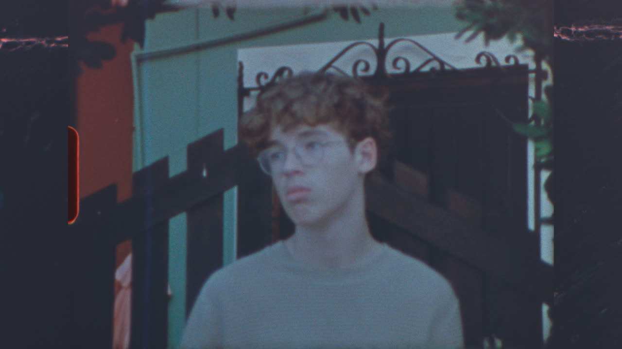 Candid Portrait of a Young Man Outdoors