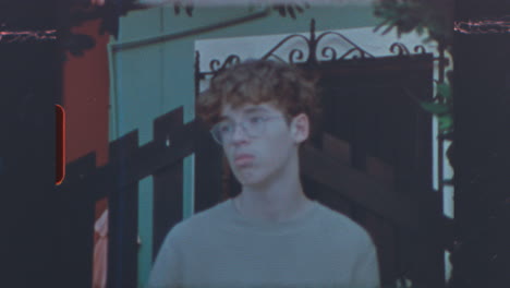 candid portrait of a young man outdoors