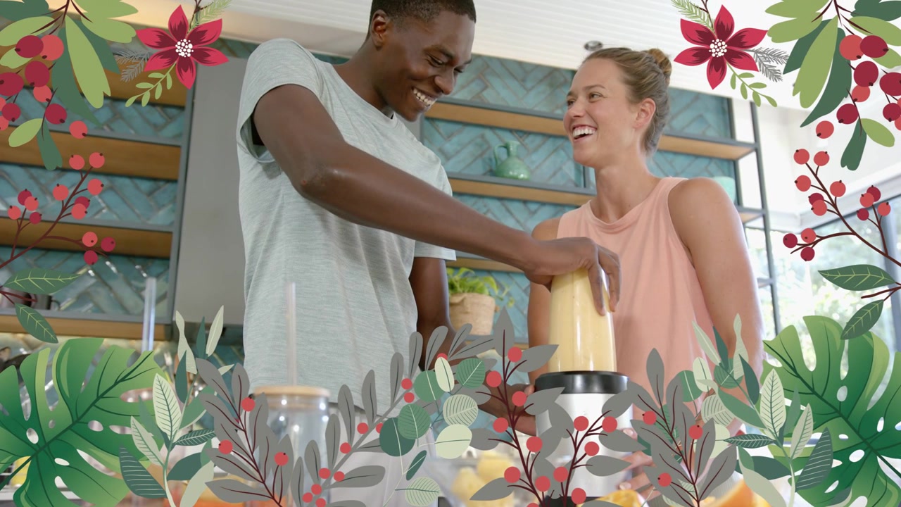 Man som trycker ner mixerlock och gör smoothie i köket, kvinna som skrattar, med blommig inramning av paret