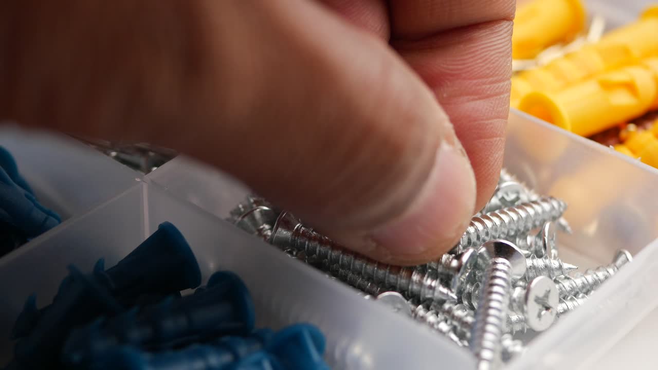 Assorted Hardware and Fasteners in Storage Box