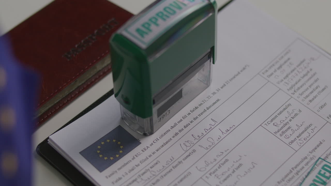 Pressing Approval Stamp on European Union Visa Application Form