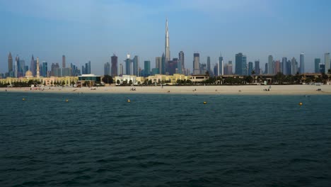 Сity-of-Dubai-and-beaches,-wide-panoramic-view---world-famous-skyline-including-the-Burj-Khalifa