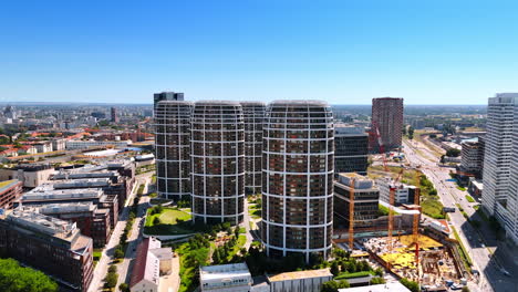 approaching a group of similar high-rises in the new urban neighborhood. modern architecture of bratislava, slovakia. aerial view