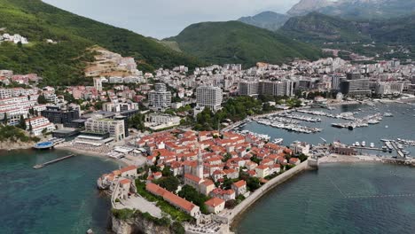 aerial drone birds eye view budva riviera old town city coastal montenegro balkan country balkans adriatic sea coastline stari grad sveti nikola island