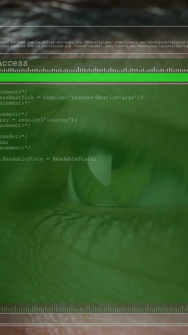 Vertical video: Male eye holding while system starting bio access scan, green HUD scrolling code