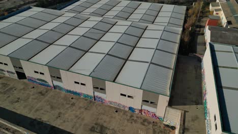 industrial warehouse roofs near abrera, barcelona, spain, aerial view