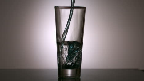 water pouring into a glass