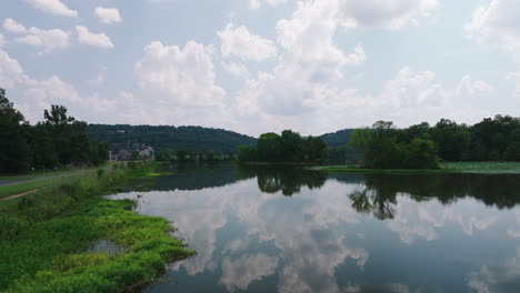 clear water with mirror reflections at cook's landing park in north little rock, arkansas, usa