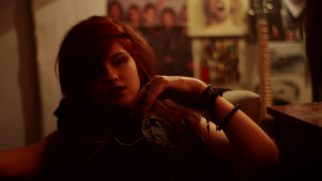 teenage girl in a rock and roll bedroom