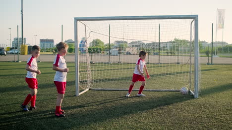 young soccer players practicing