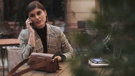 businesswoman in a coffee break outdoor.