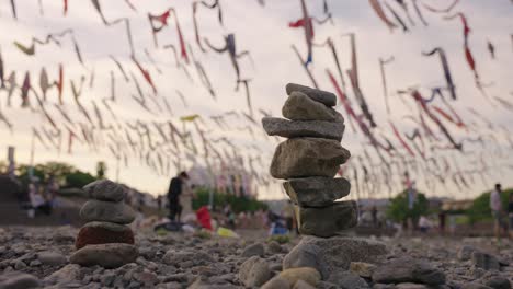 children's day in japan, koi streamers in de-focused background along river