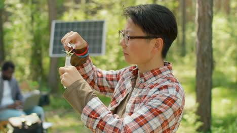 scientist putting sample into tube