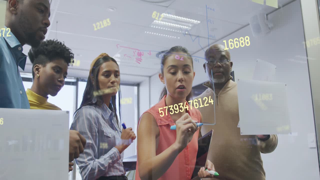 Animation of financial data processing over diverse business people having meeting at office