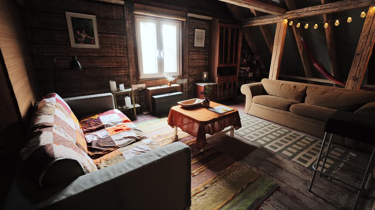 Warm attic room with rustic charm, natural textures, and comfortable seating