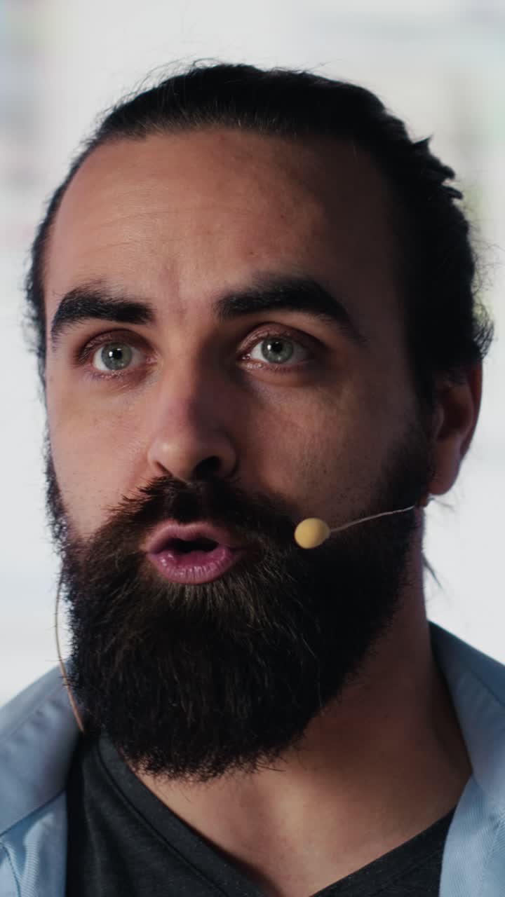 Vertical Video Male public speaker discussing with audience during live social media event