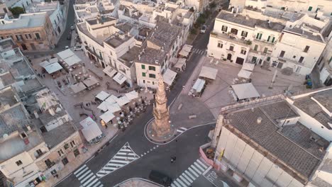 aerial perspective of a central monument in ostuni italy