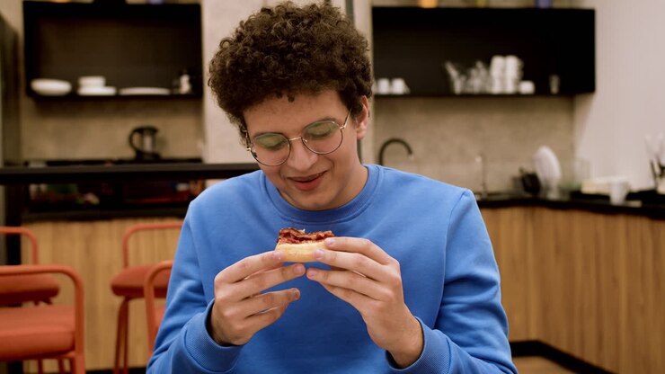 Man eating fast food