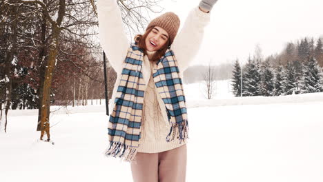 woman enjoying a snowy day