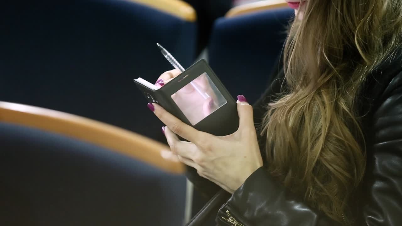 Woman Using Digital Tablet. Close up of a woman using digital tablet on a business meeting