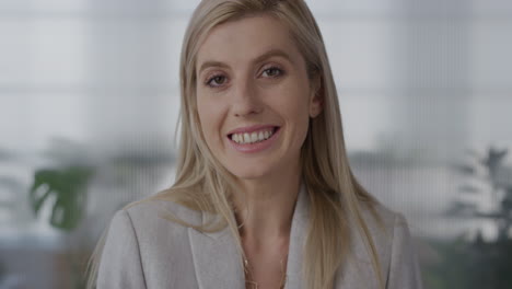 portrait attractive young blonde business woman smiling enjoying professional corporate lifestyle successful female entrepreneur looking happy slow motion