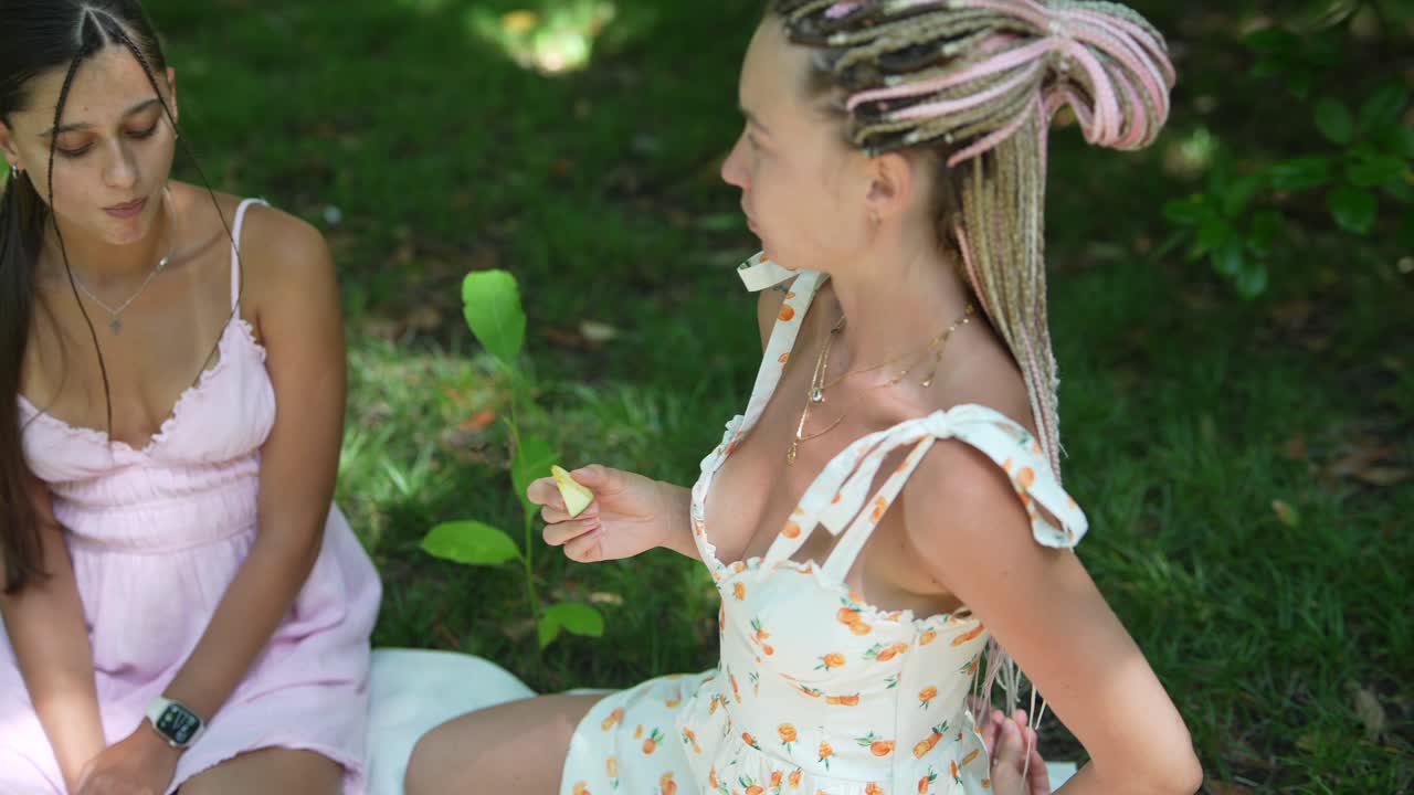 Two women having a picnic in the park