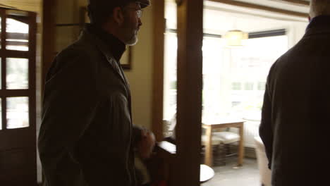 gay couple checking in to boutique hotel shot on r3d