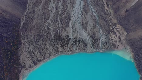 Incredibly-deep-blue-water-lake-at-the-base-of-a-glacier-in-Arctic-Norway